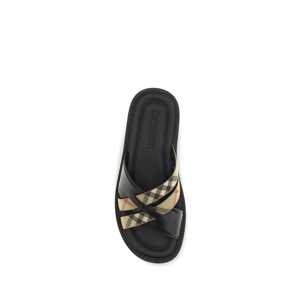 Sandales plates Burberry en cuir de veau noir Bos Taurus
