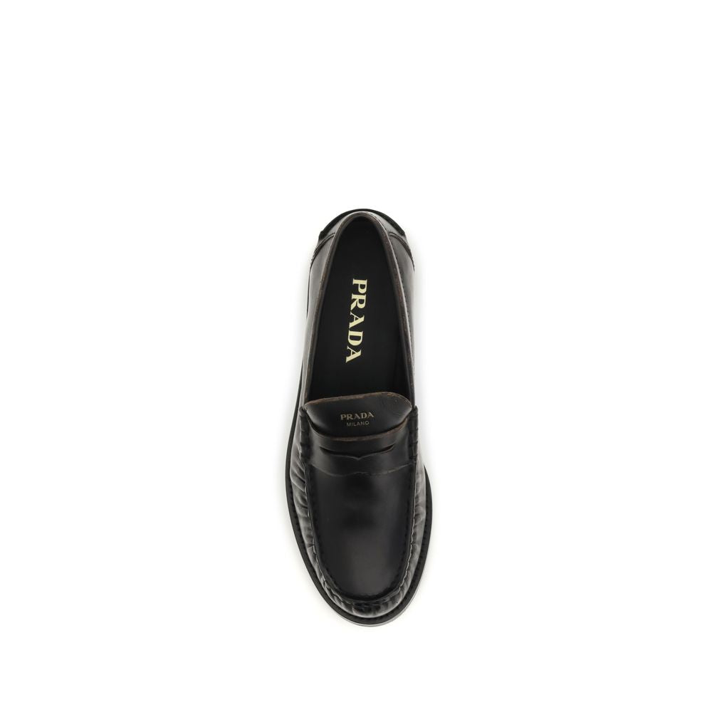 Mocassins à enfiler Prada en cuir de veau noir