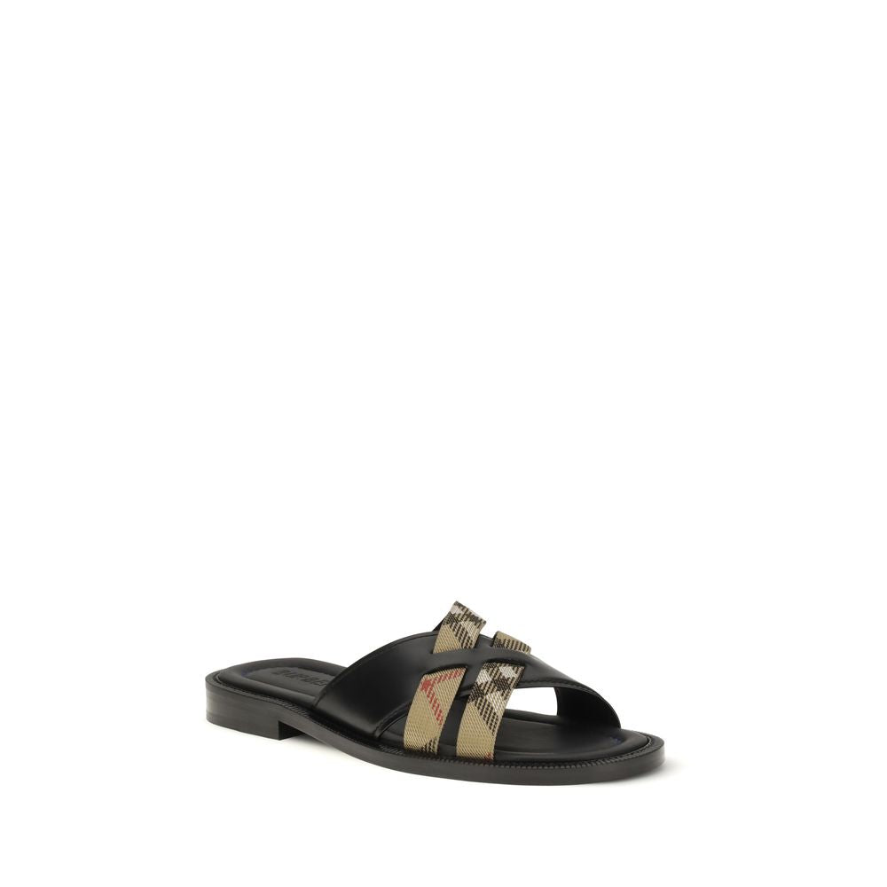 Sandales plates Burberry en cuir de veau noir Bos Taurus