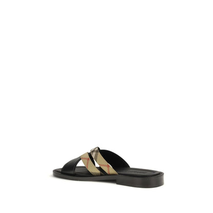 Sandales plates Burberry en cuir de veau noir Bos Taurus