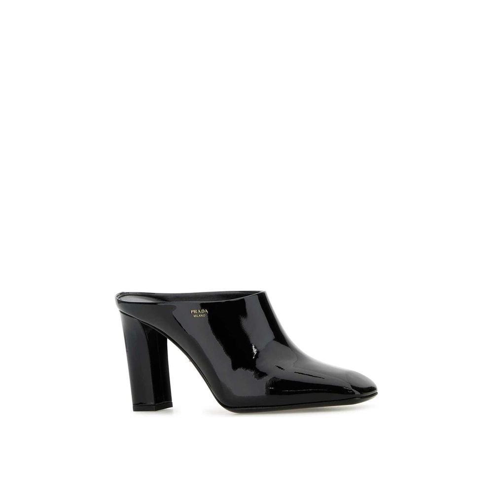 Mules en cuir de veau noir Prada