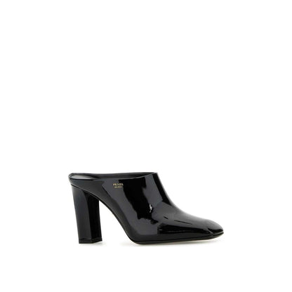 Mules en cuir de veau noir Prada