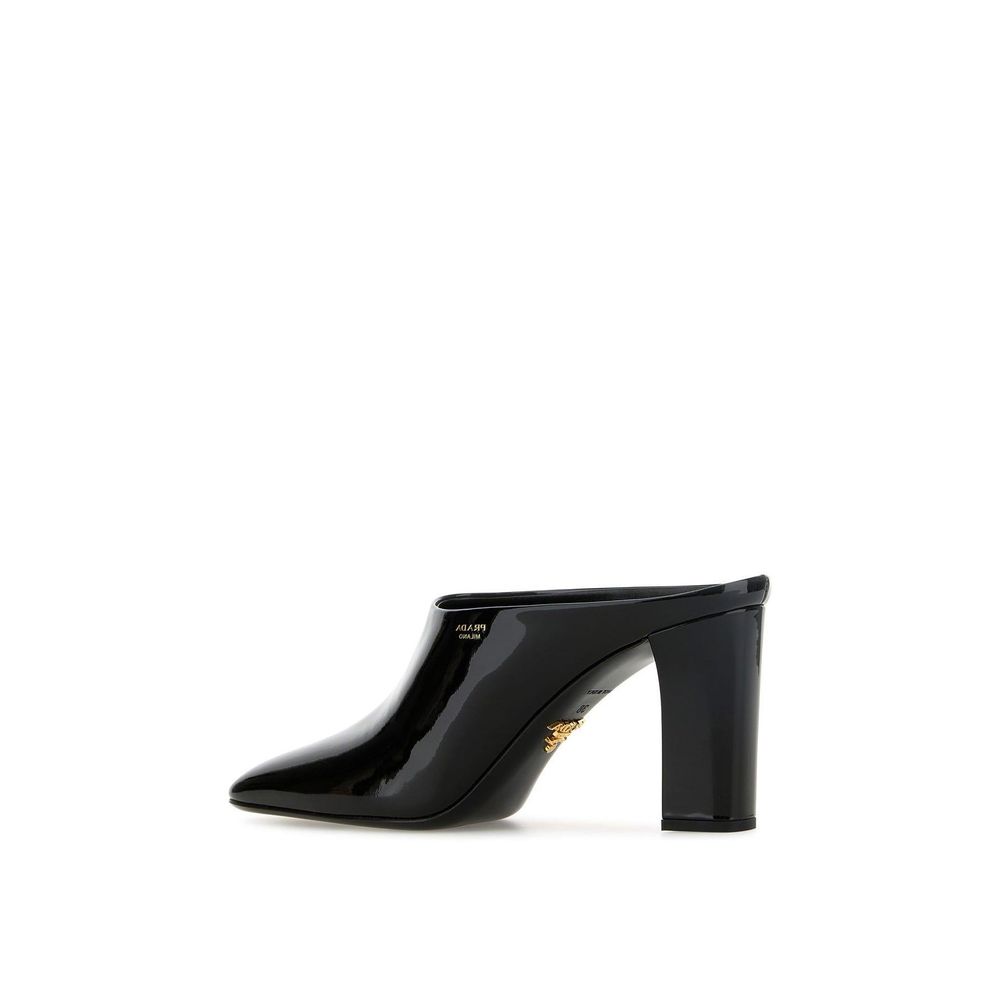 Mules en cuir de veau noir Prada