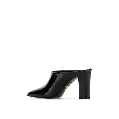 Mules en cuir de veau noir Prada