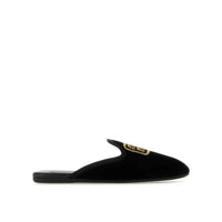 Mules Miu Miu en cuir de veau noir