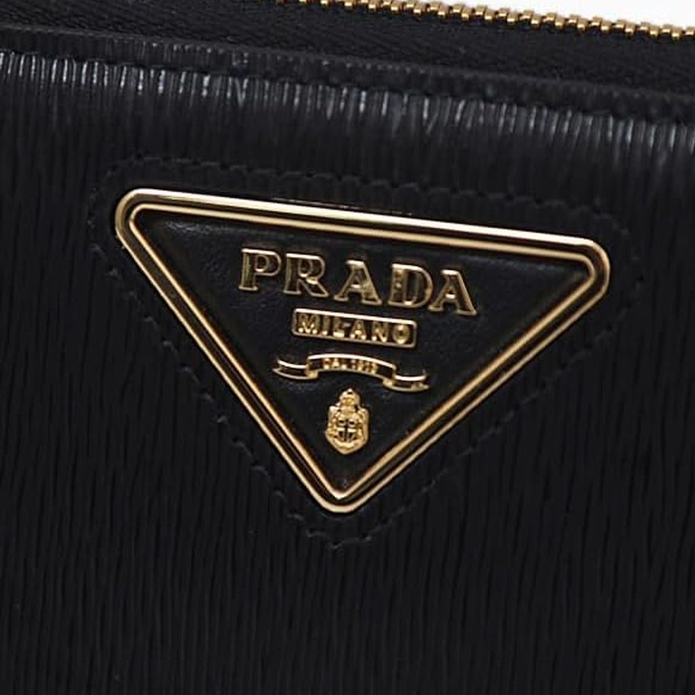 Portefeuille Prada en cuir de veau noir