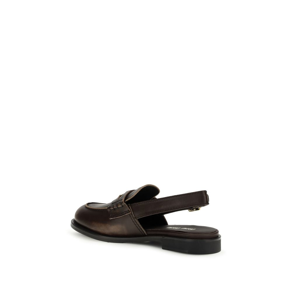 Mocassins à enfiler Miu Miu Bos Taurus en cuir de veau marron