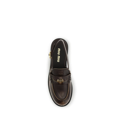Mocassins à enfiler Miu Miu Bos Taurus en cuir de veau marron