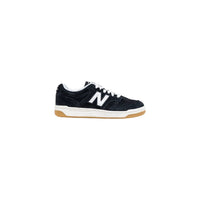 Baskets de sport New Balance en cuir noir et blanc
