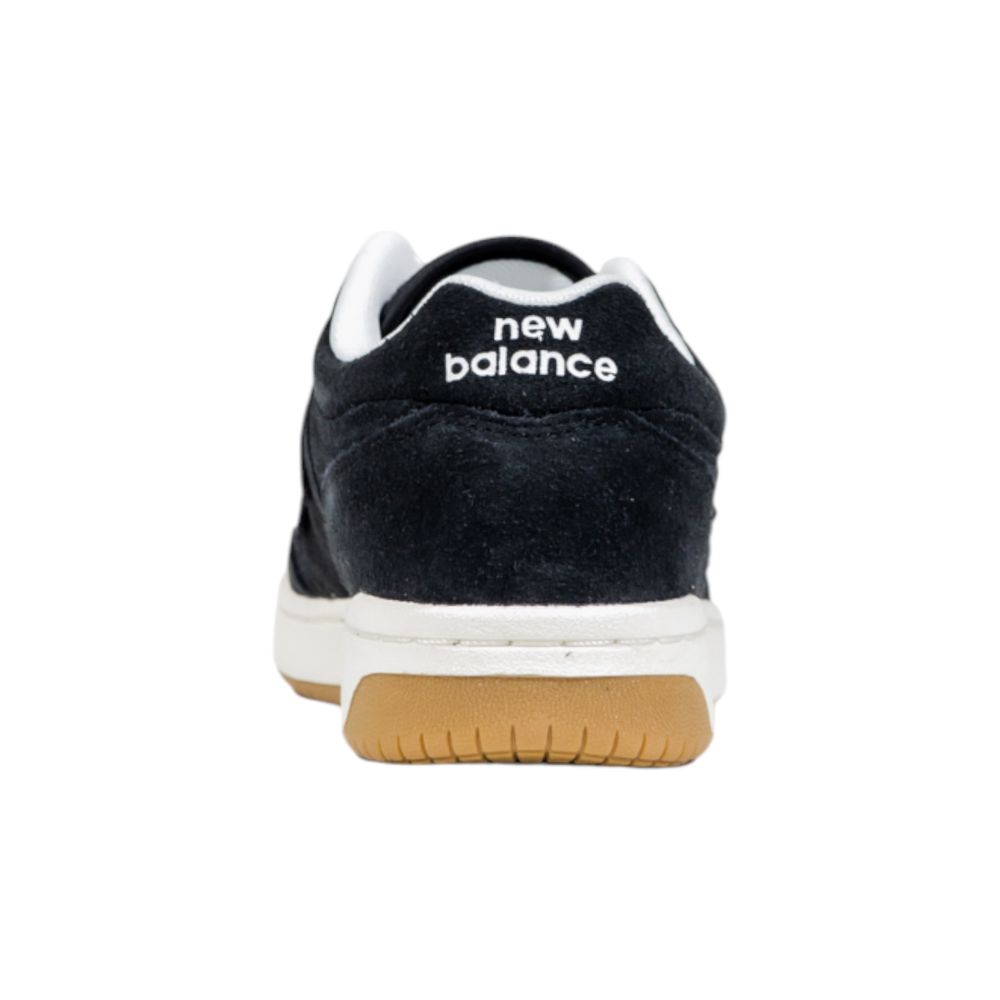 Baskets de sport New Balance en cuir noir et blanc