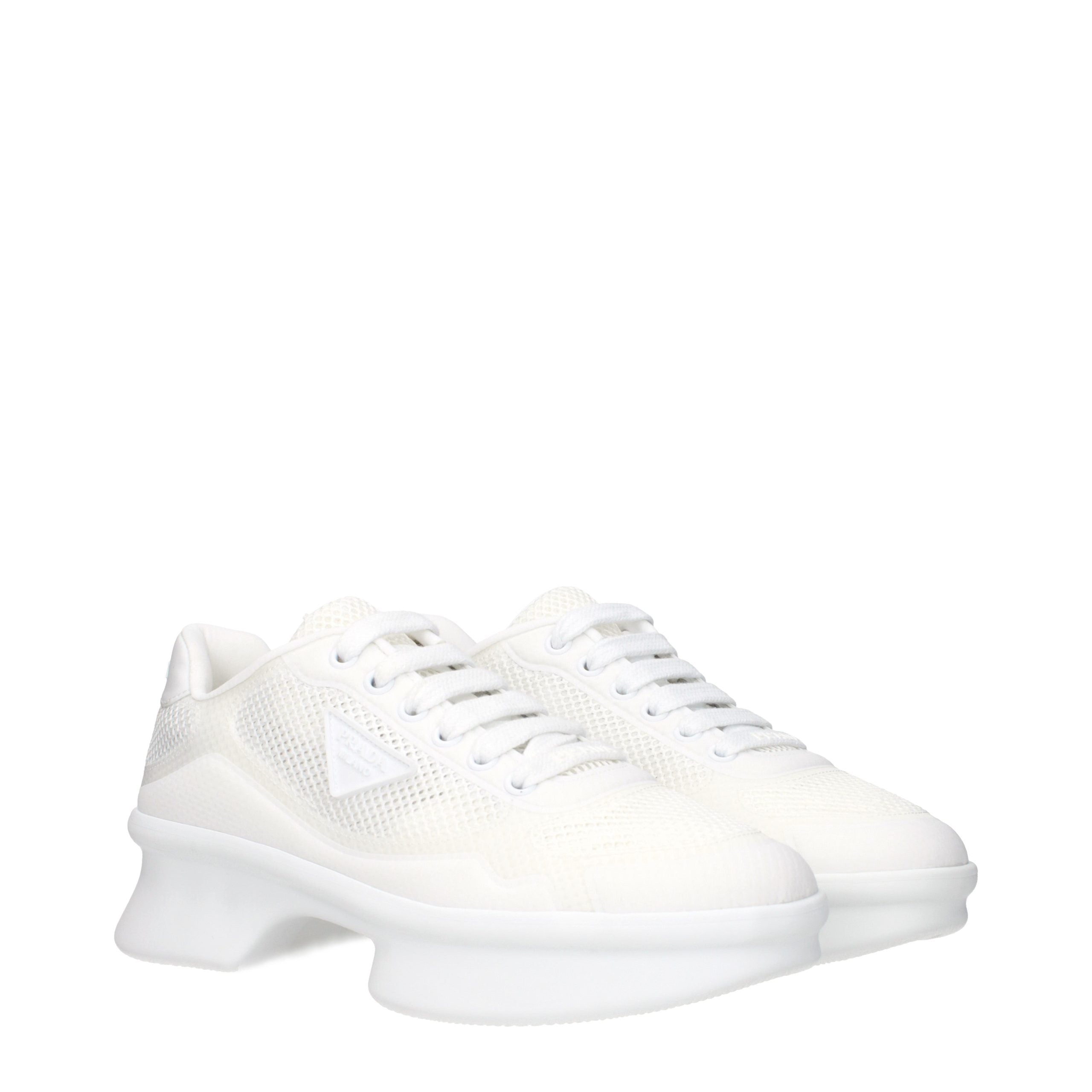 Sneakers basse Prada in tela bianca