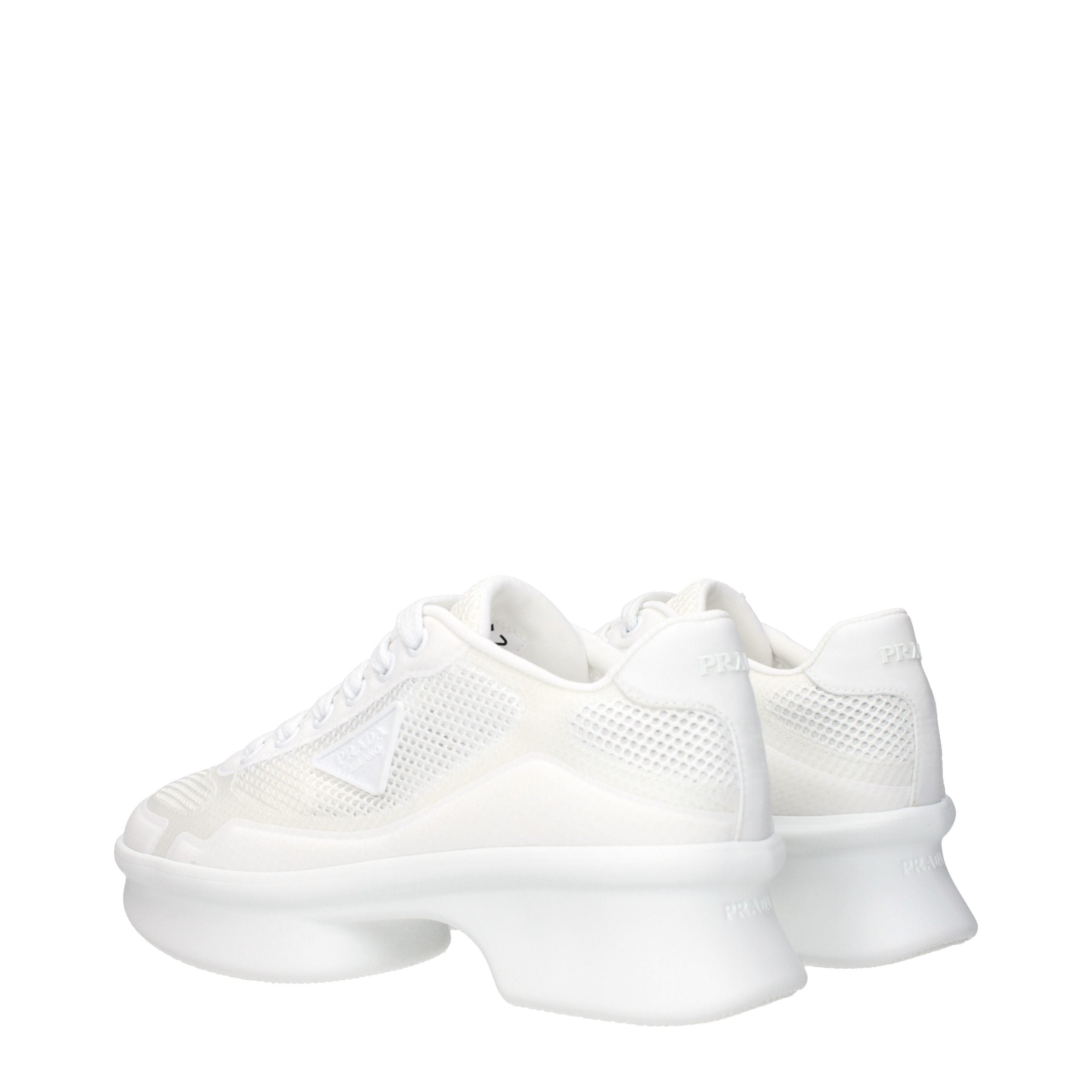Sneakers basse Prada in tela bianca