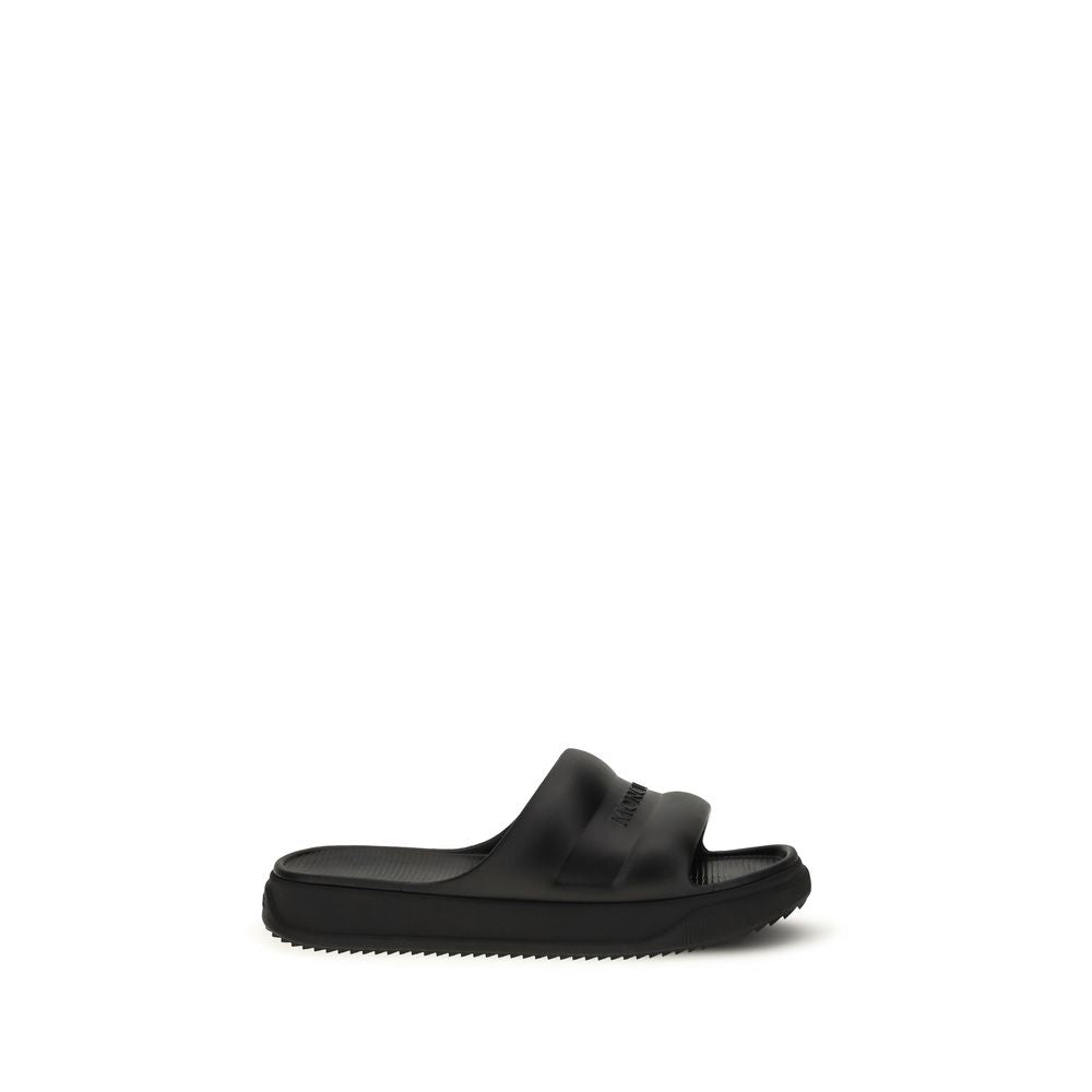 Sandales plates Moncler en caoutchouc noir