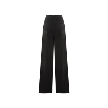 Pantaloni svasati Balenciaga in lana nera