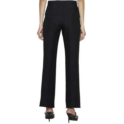 Pantaloni svasati in seta neri Valentino Garavani