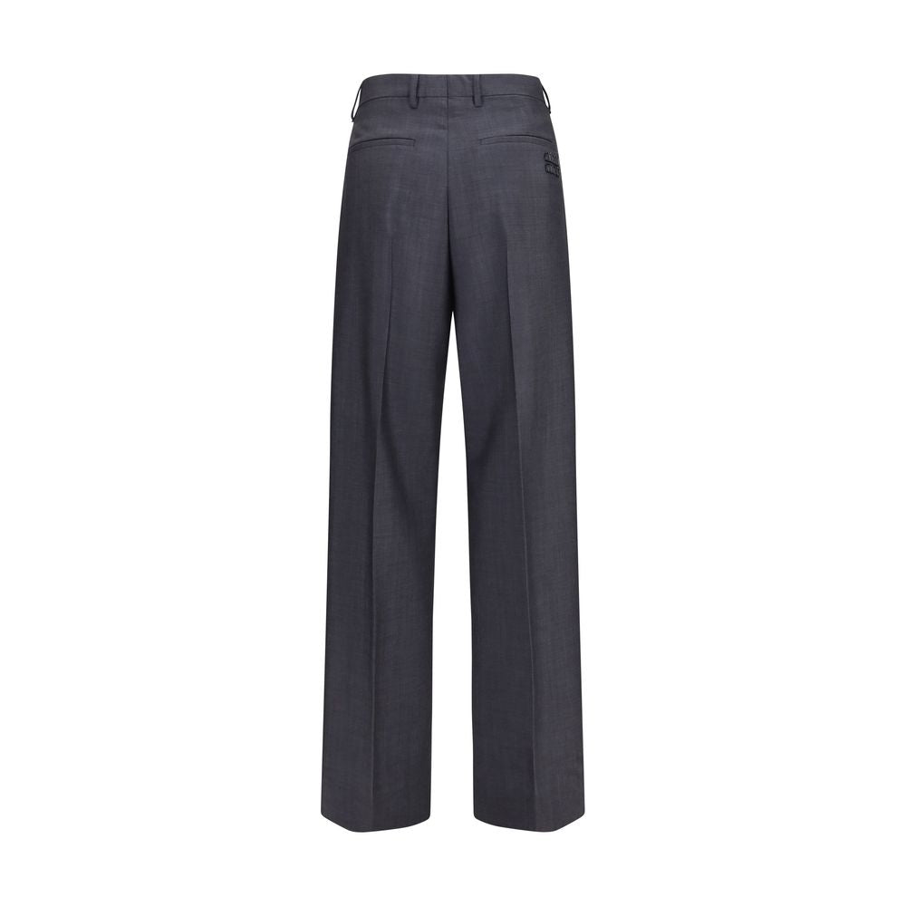 Pantaloni eleganti Miu Miu Oves Aries in lana grigia