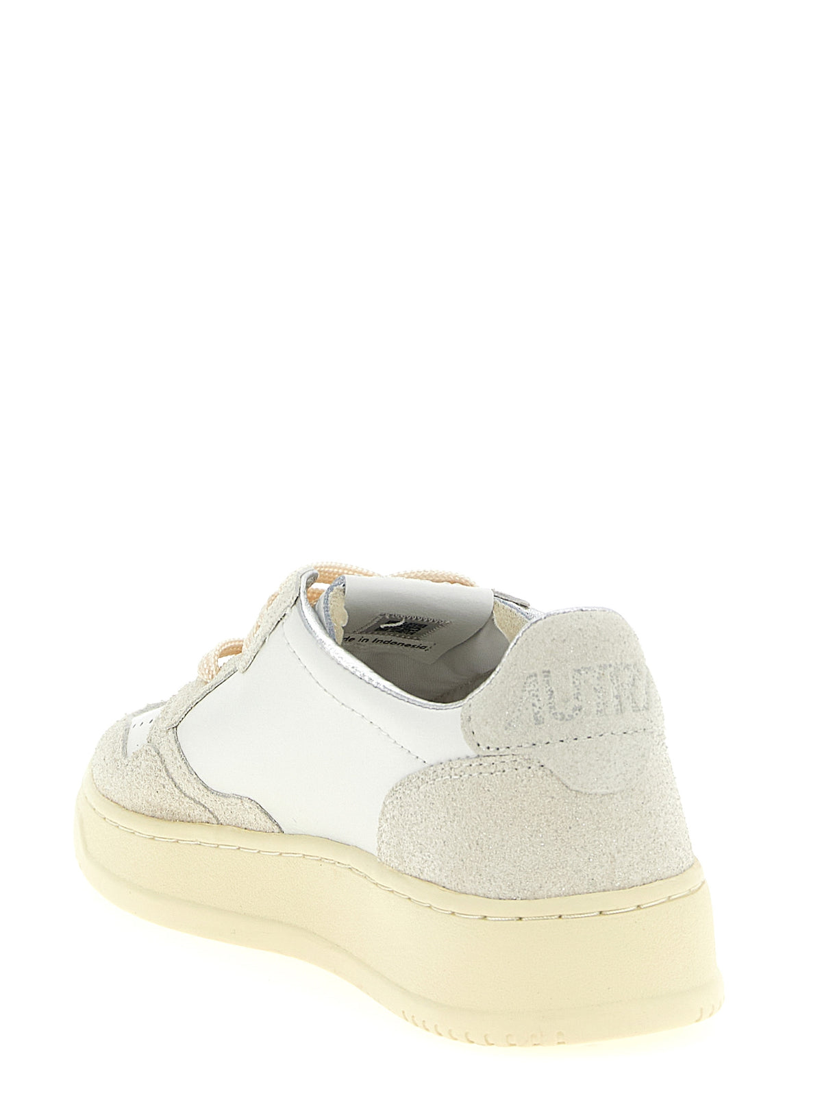 Sneakers basse Autry in pelle di vacchetta beige