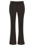 I pantaloni a zampa marroni in lana vergine The Attico