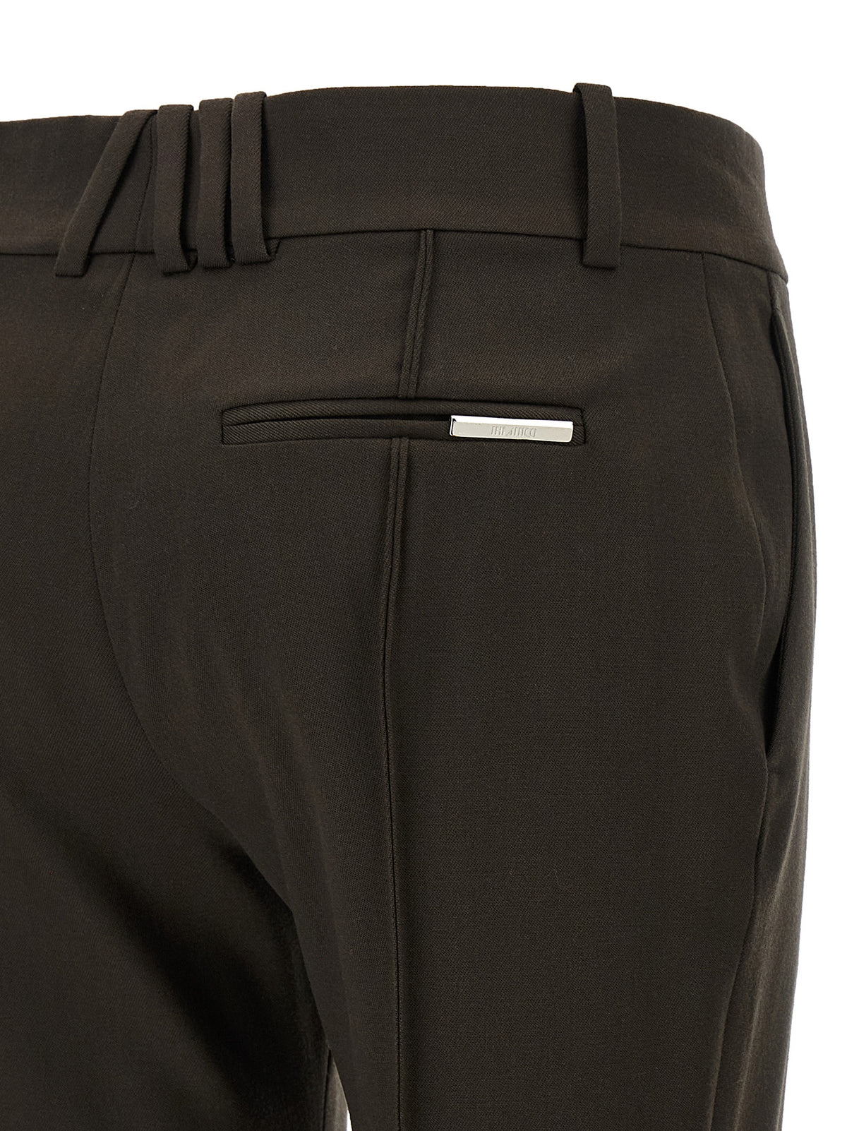 I pantaloni a zampa marroni in lana vergine The Attico