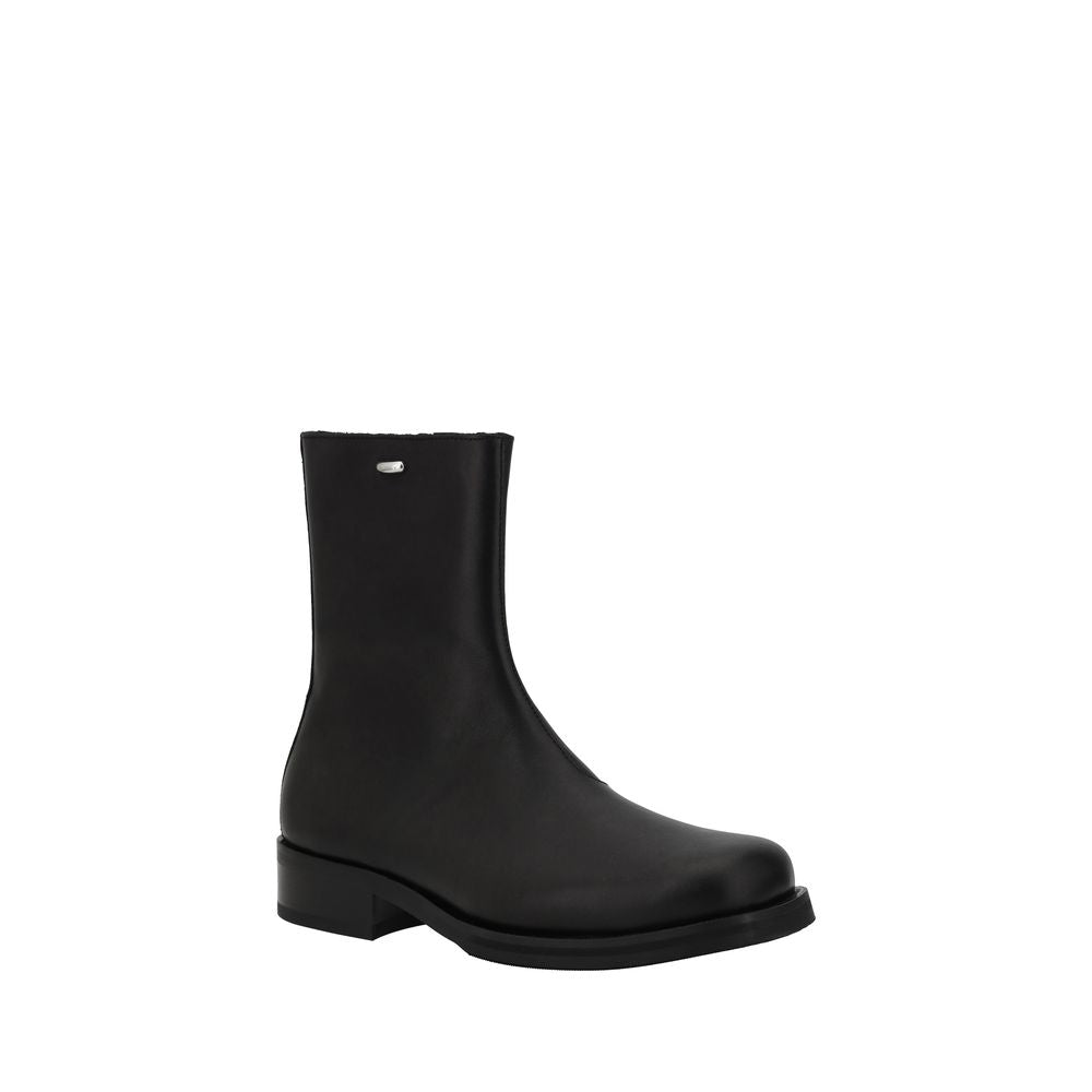 Nos bottines Legacy en cuir de veau noir Bos Taurus