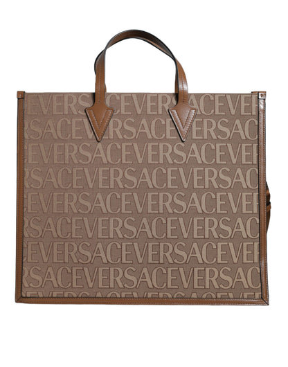 Sac cabas bandoulière Versace en cuir jacquard marron avec poignée supérieure et logo
