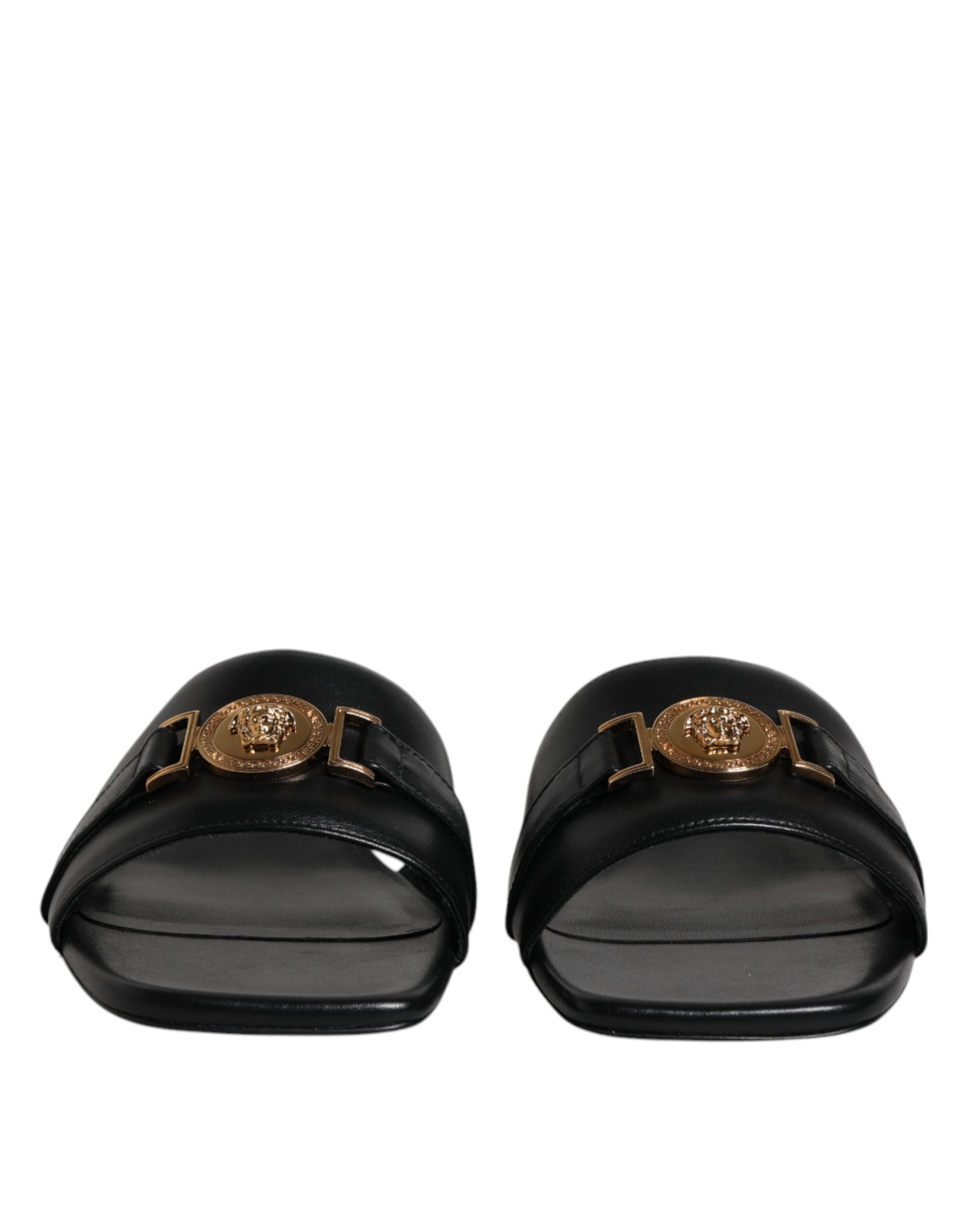 Scarpe basse slip-on con placca logo in pelle nera Versace