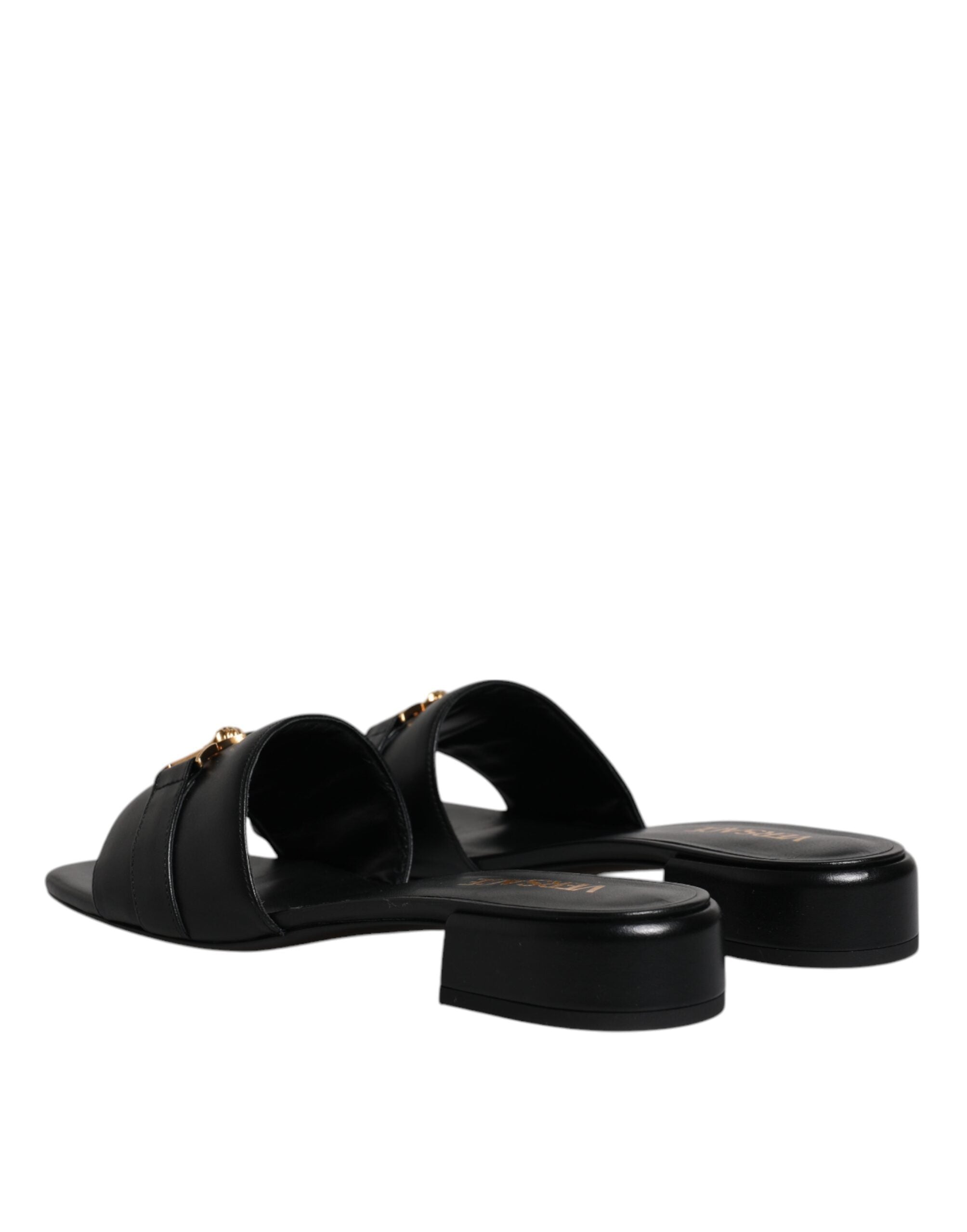 Scarpe basse slip-on con placca logo in pelle nera Versace
