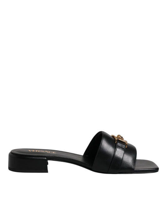 Scarpe basse slip-on con placca logo in pelle nera Versace