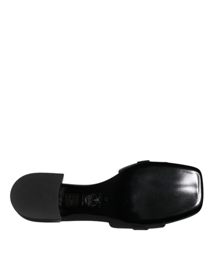 Sandales plates Versace en cuir noir avec plaque logo