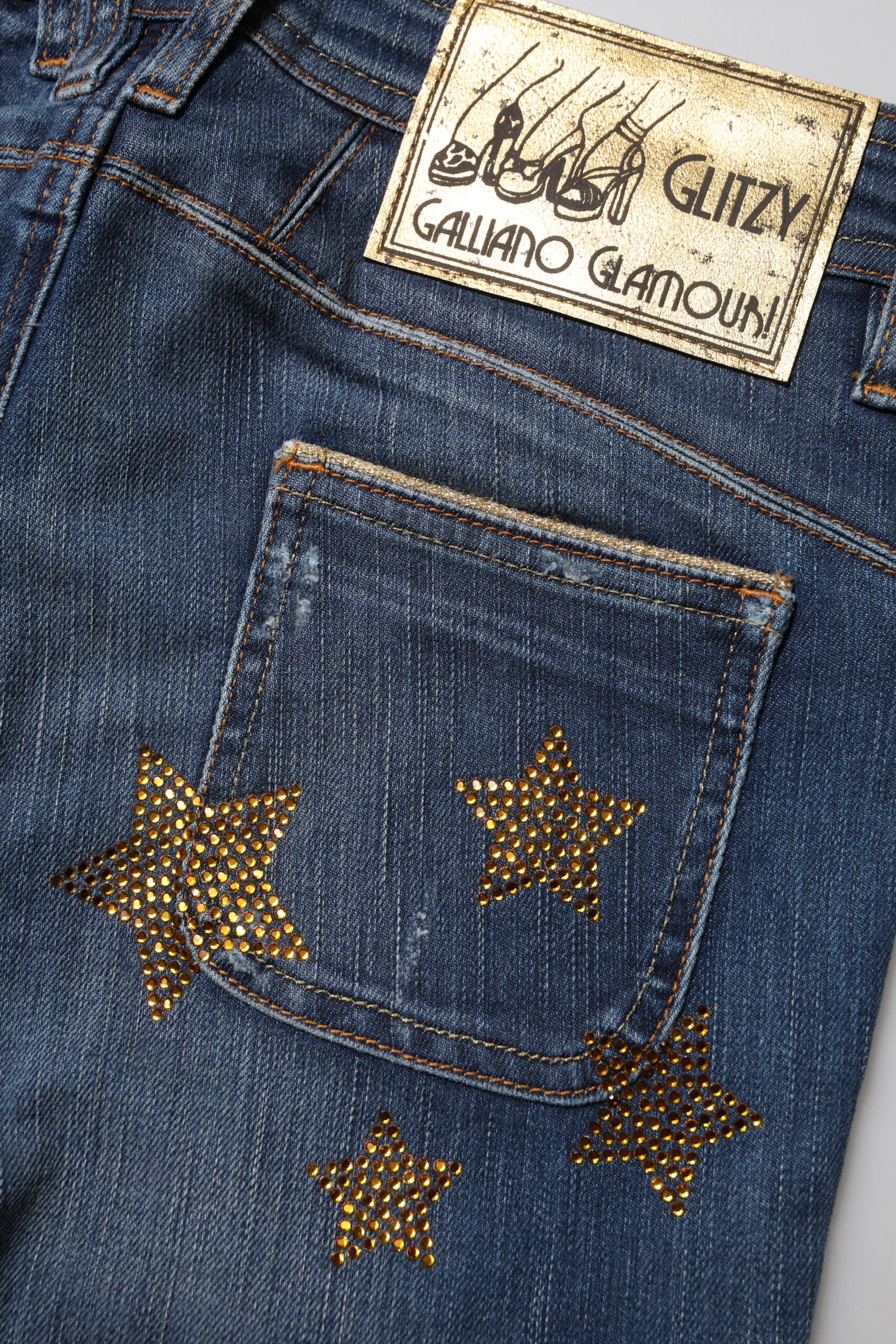 Jean en denim bleu coton John Galliano, taille mi-haute, jambes larges