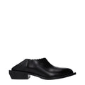 Mules en cuir noir Moschino