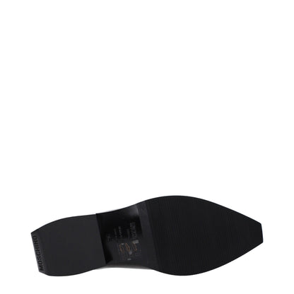 Mules in pelle nera Moschino