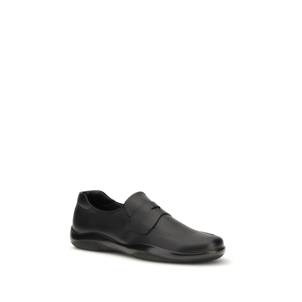 Mocassini slip-on Prada Bos Taurus in pelle di vitello nera