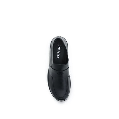 Mocassini slip-on Prada Bos Taurus in pelle di vitello nera